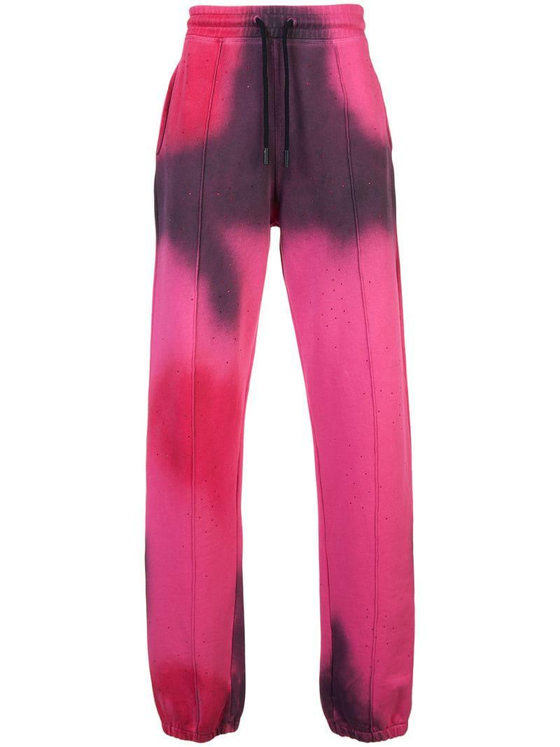 Off White C O Virgil Abloh Spray Paint Track Pants In Pink For Men Off White C O Virgil Abloh Men S Pink Spray Paint Track Trousers