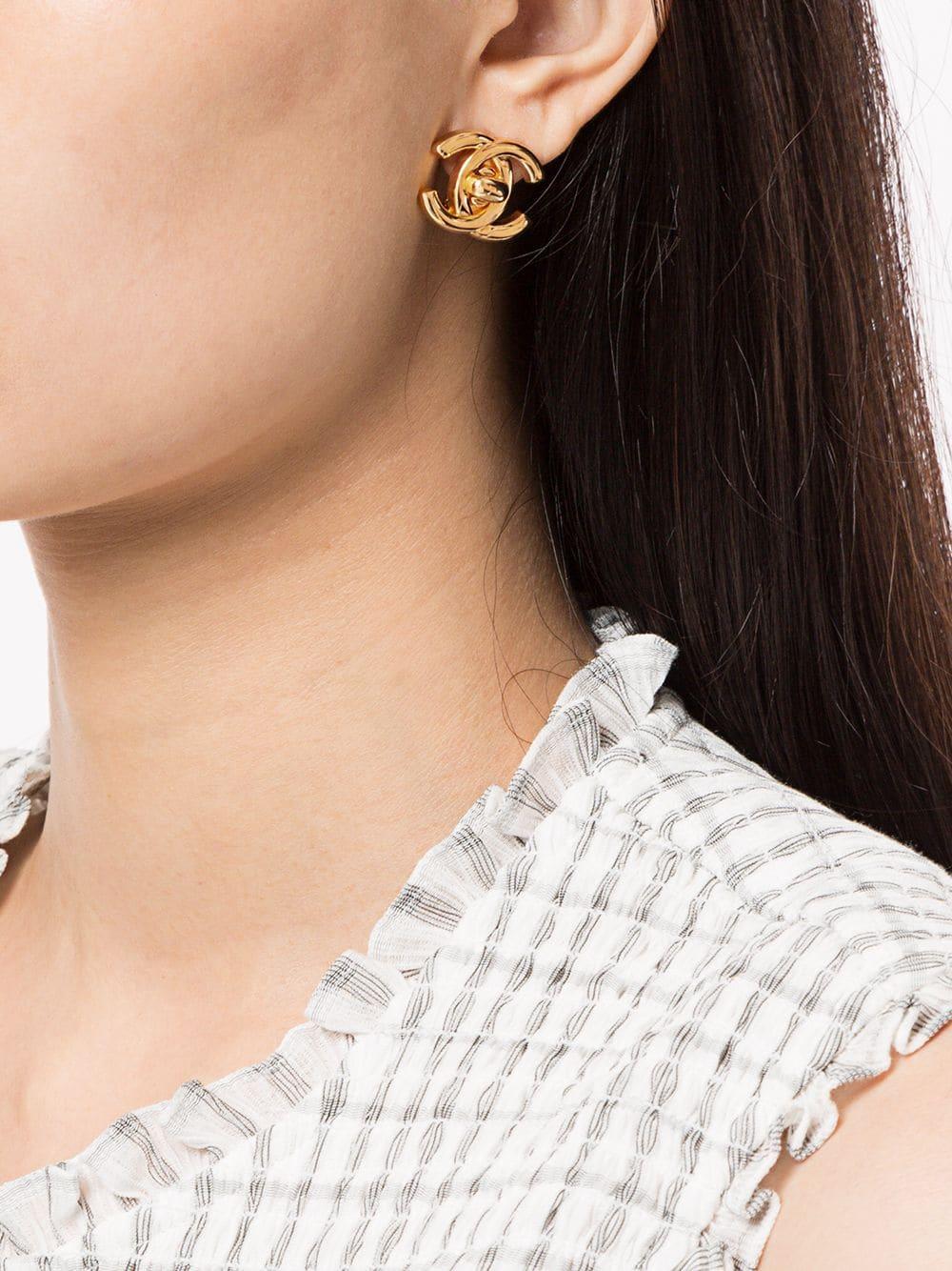 Chanel Pre-Owned Cc Turn-lock Earrings in Metallic | Lyst