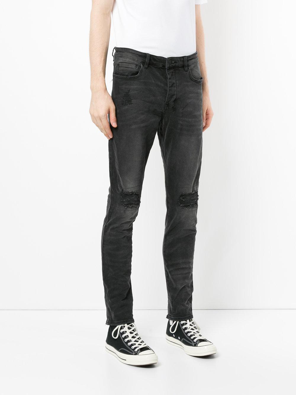 black ripped ksubi jeans