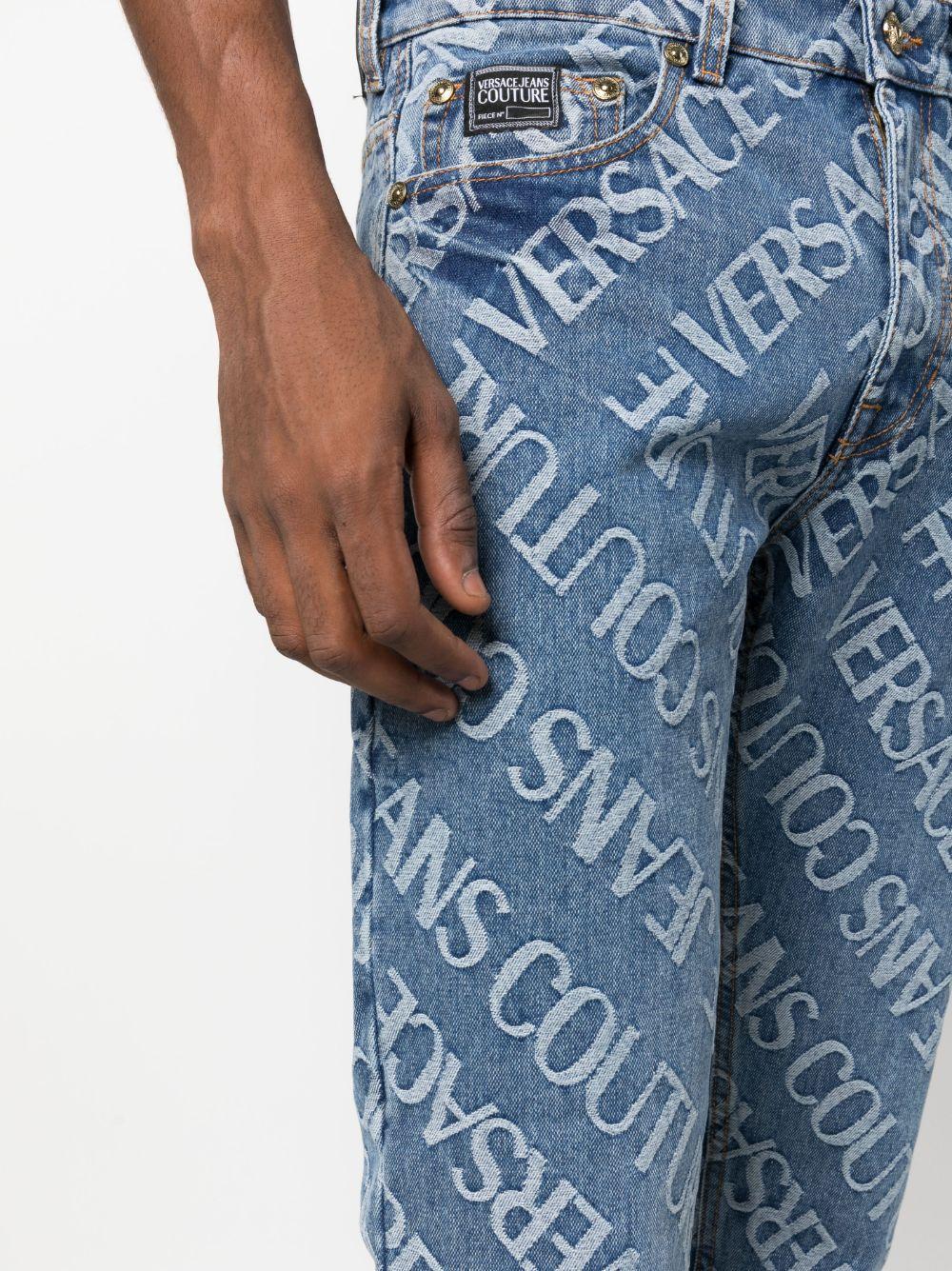 Versace Baroque Jacquard Denim Jeans In Blue