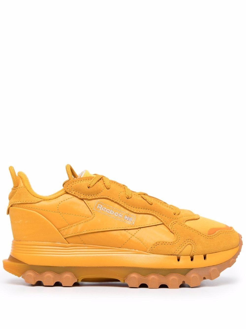 cardi b yellow sneakers