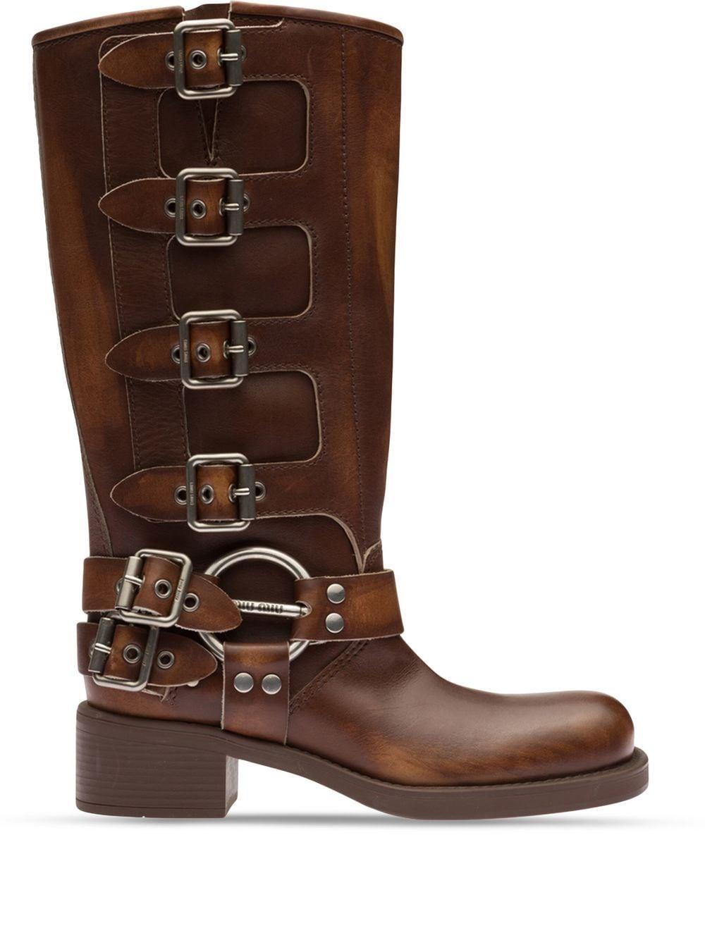Brown boots with clearance buckles on the side