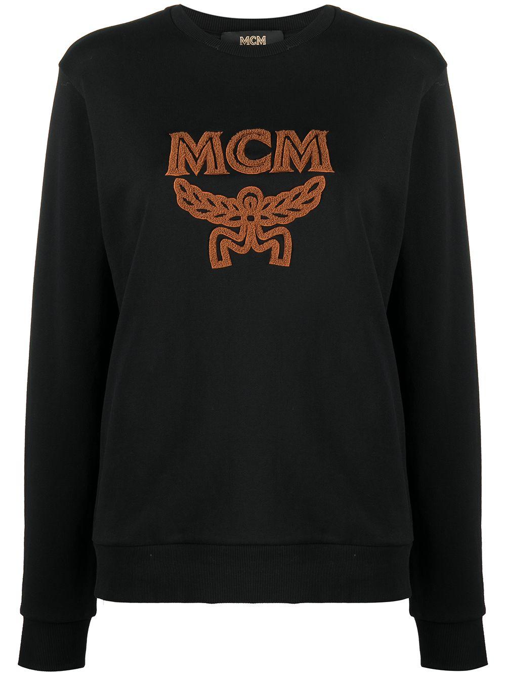 MCM Baumwolle Sweatshirt mit Shearling-Logo in Schwarz - Lyst
