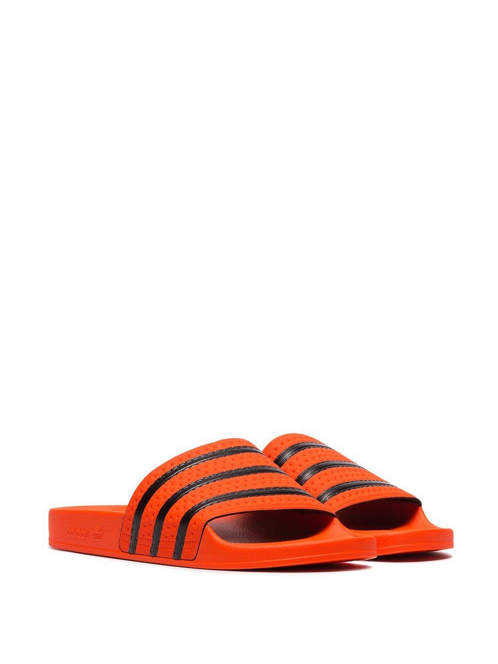 adidas Orange Adilette Rubber Slides for Men | Lyst