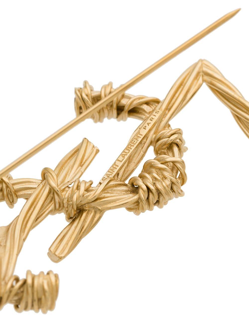 saint laurent brooches in brass … curated on LTK