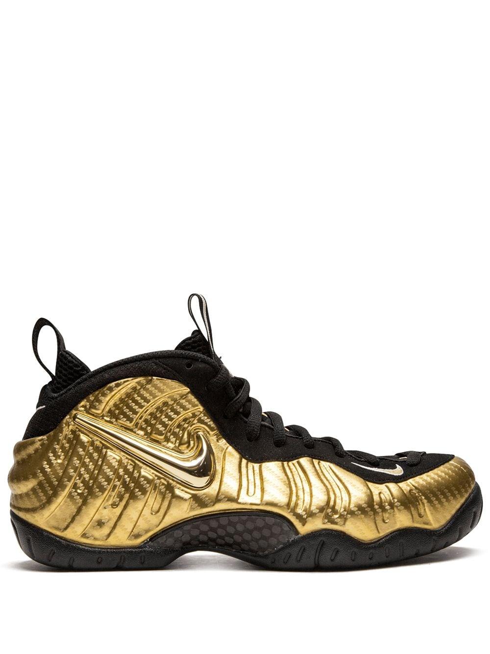 black and gold foamposites footlocker