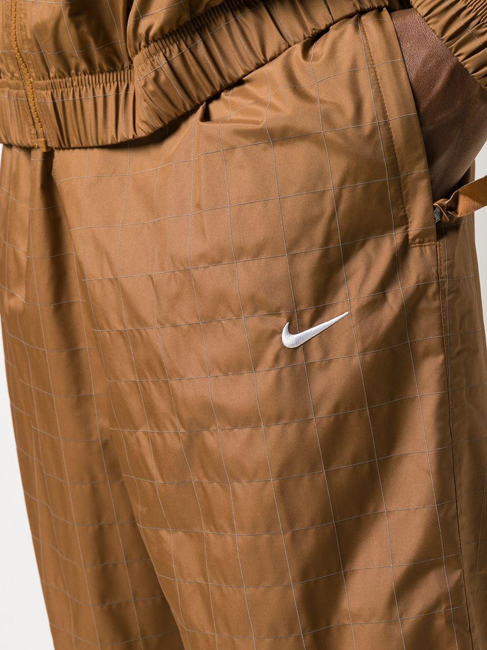 jogging nike a carreau