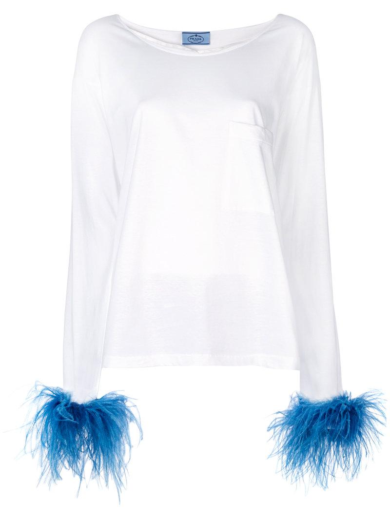 white shirt with feathers