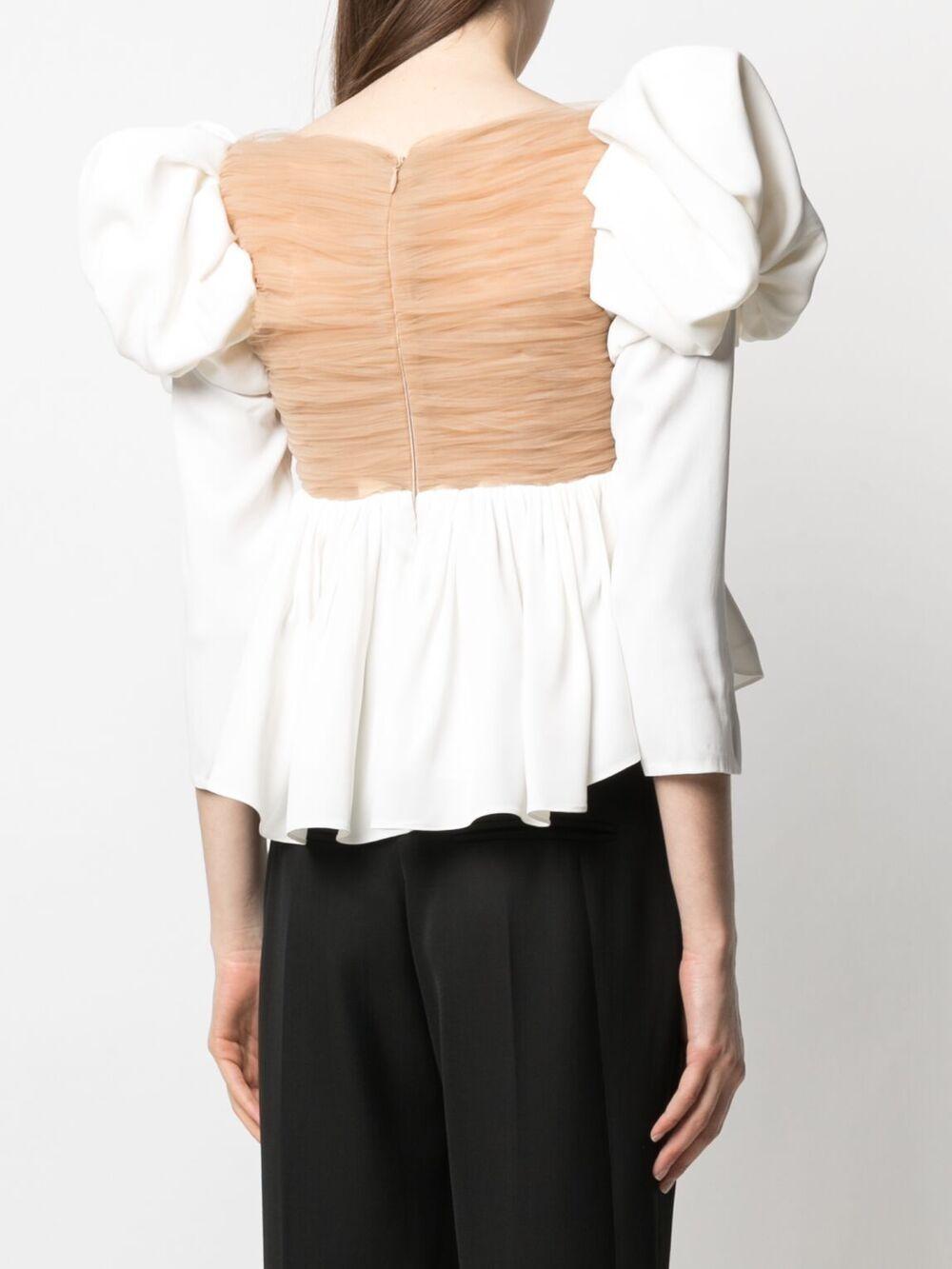 Khaite Puff-sleeve Peplum Blouse in White | Lyst