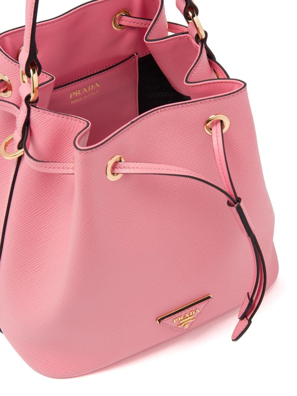 Prada Leather Triangle Patch Bucket Bag in Pink | Lyst