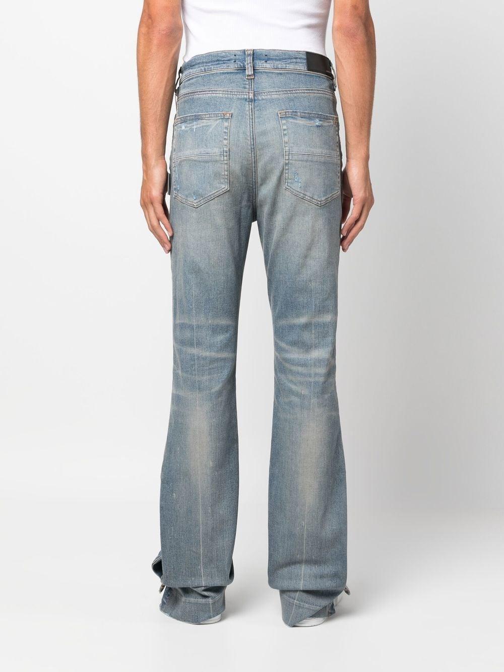 Amiri Stack Distressed-effect Flared Jeans in Blue for Men | Lyst