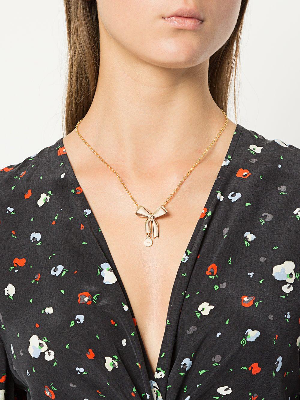 Lyst Karen Walker 9kt Gold Bow Pendant Necklace In Metallic