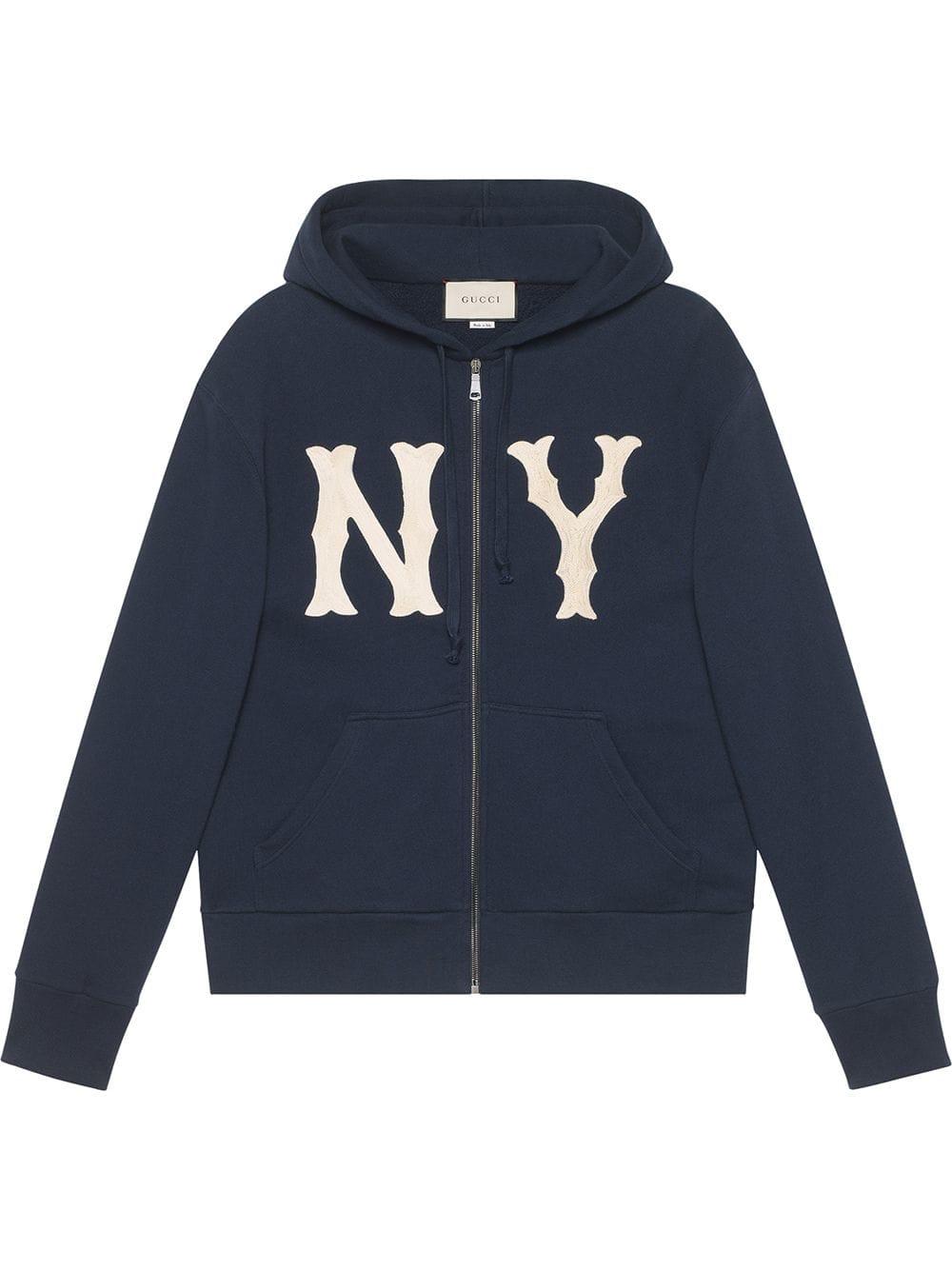 Shop the Men's jacket with NY Yankees™ patch by Gucci. A blue