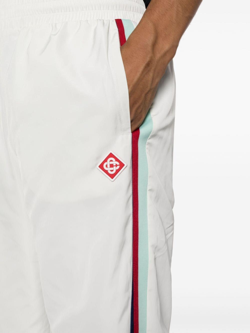 White track pants red cheap stripe