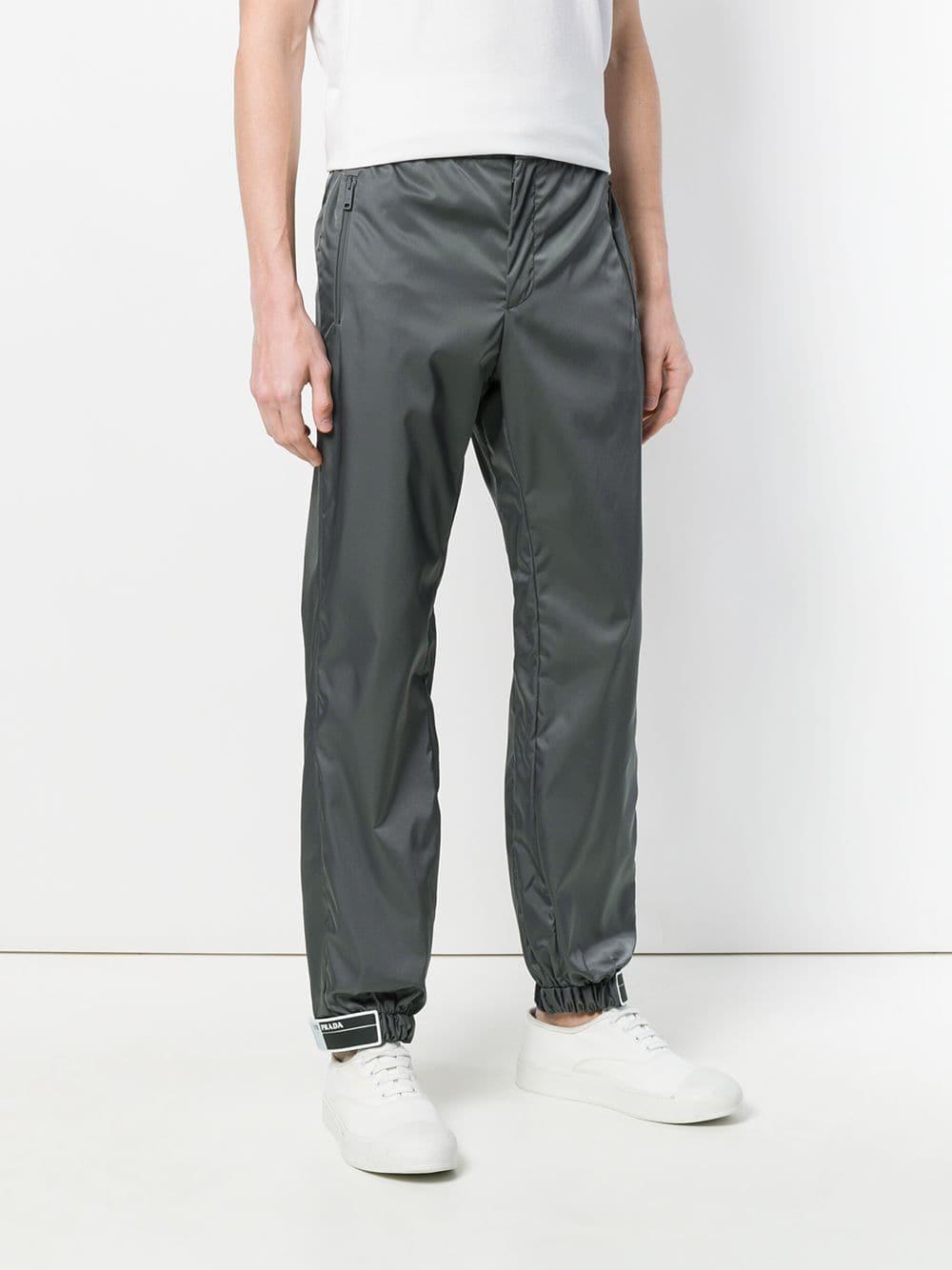 prada rubber tag track pants