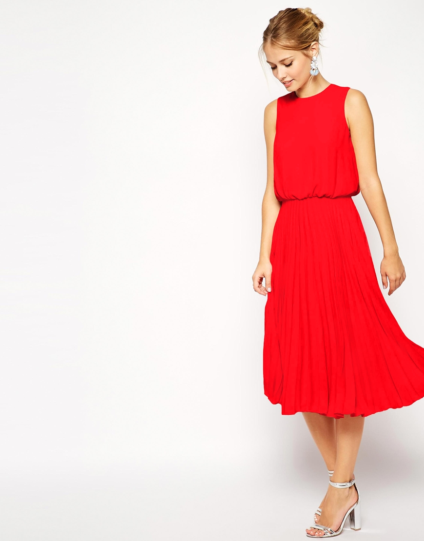 red dress with pleated skirt