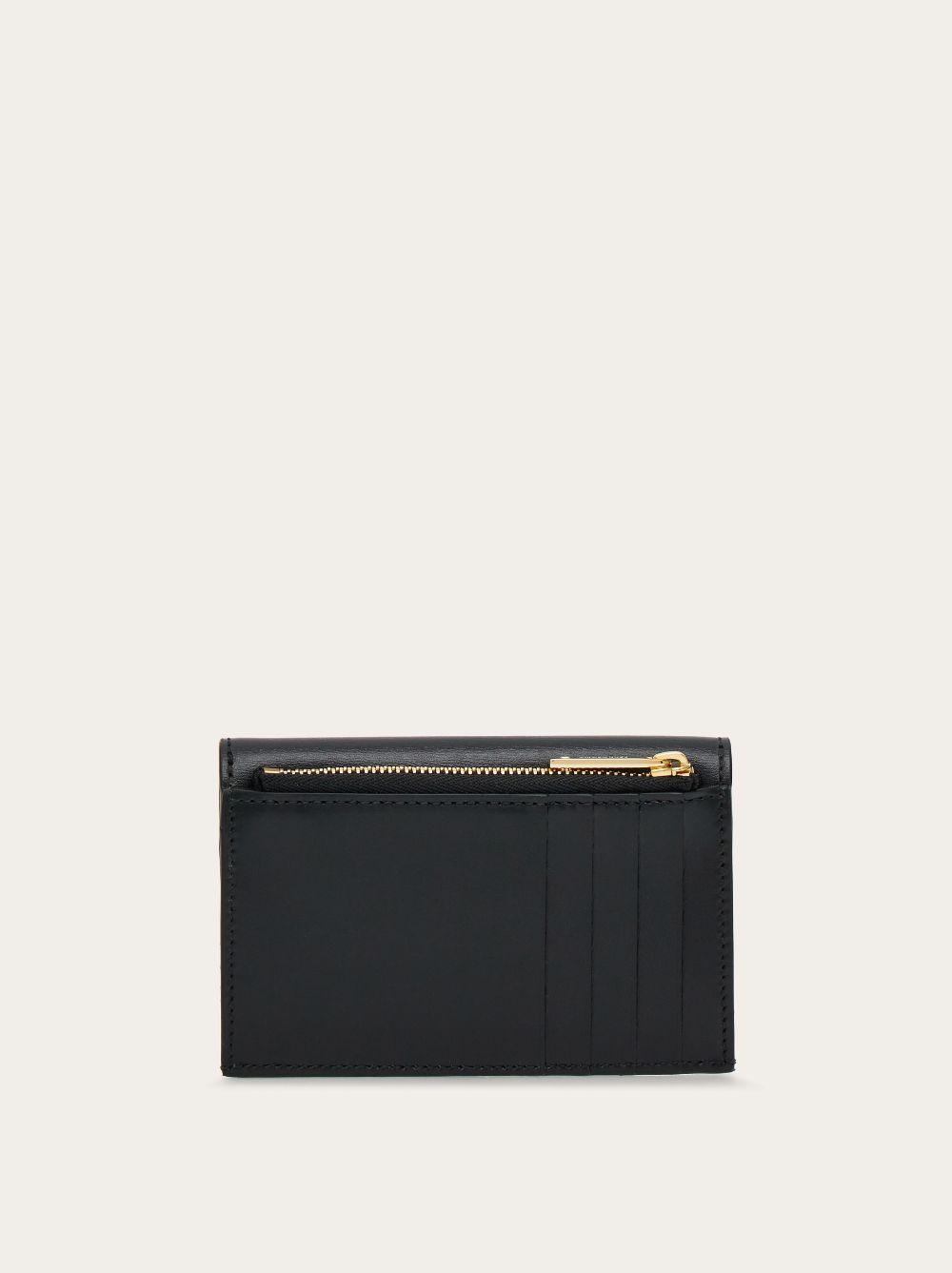 Tarjetero ferragamo sales