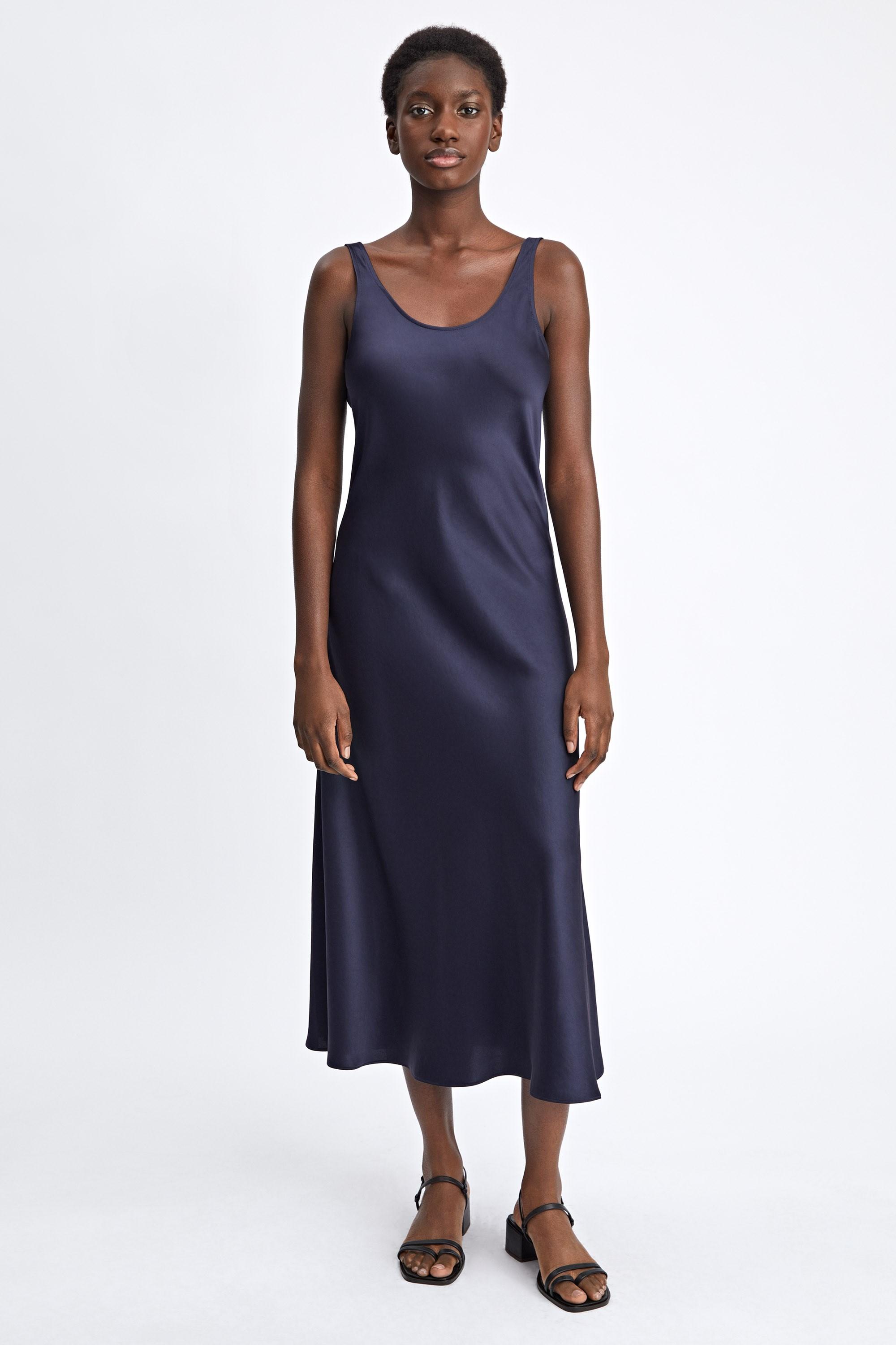 slip dress with long sleeve shirt underneath