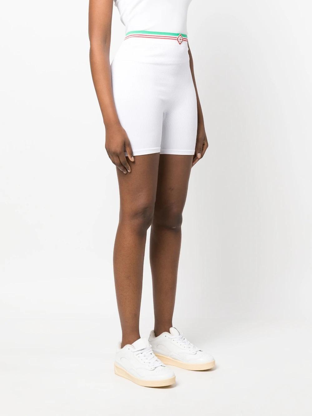 White knee top length shorts