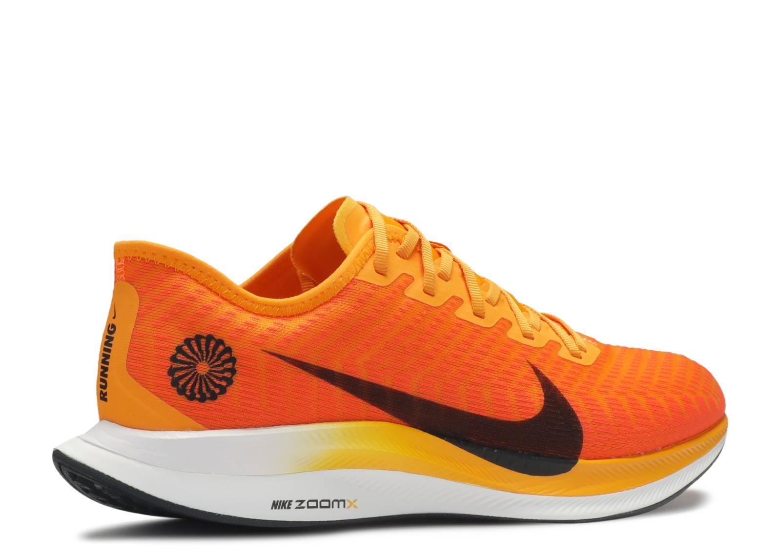 nike pegasus turbo orange