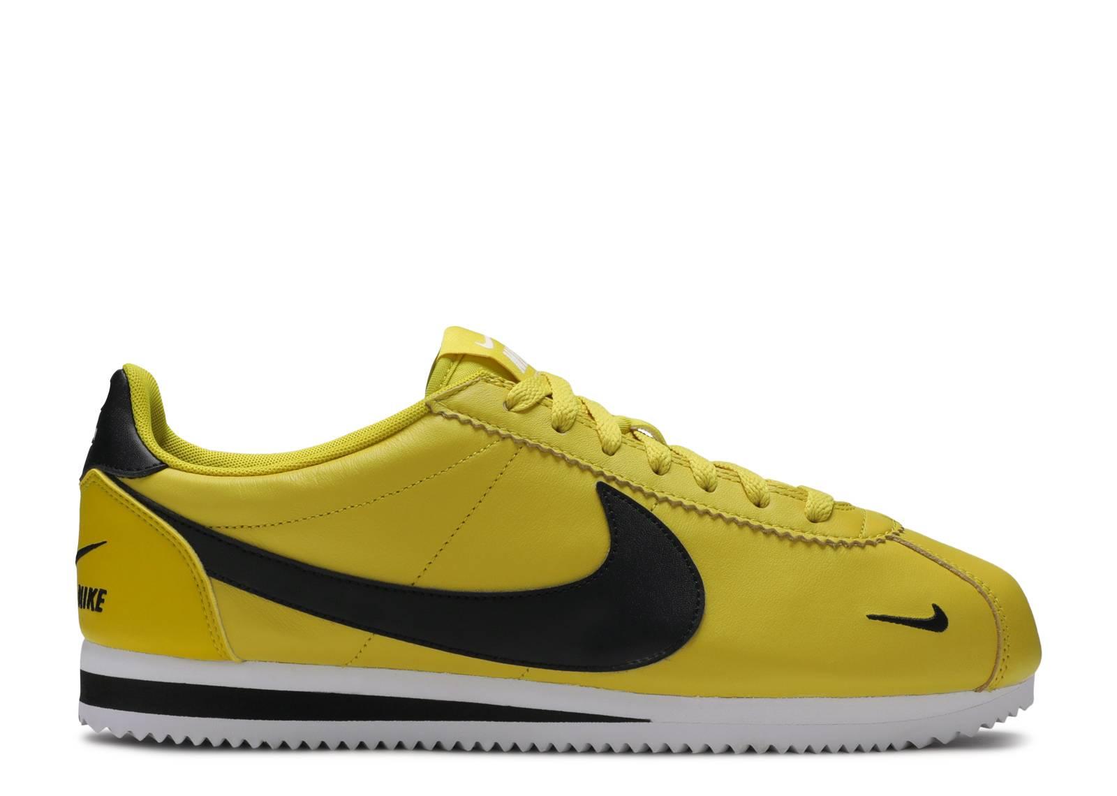 nike cortez yellow and black