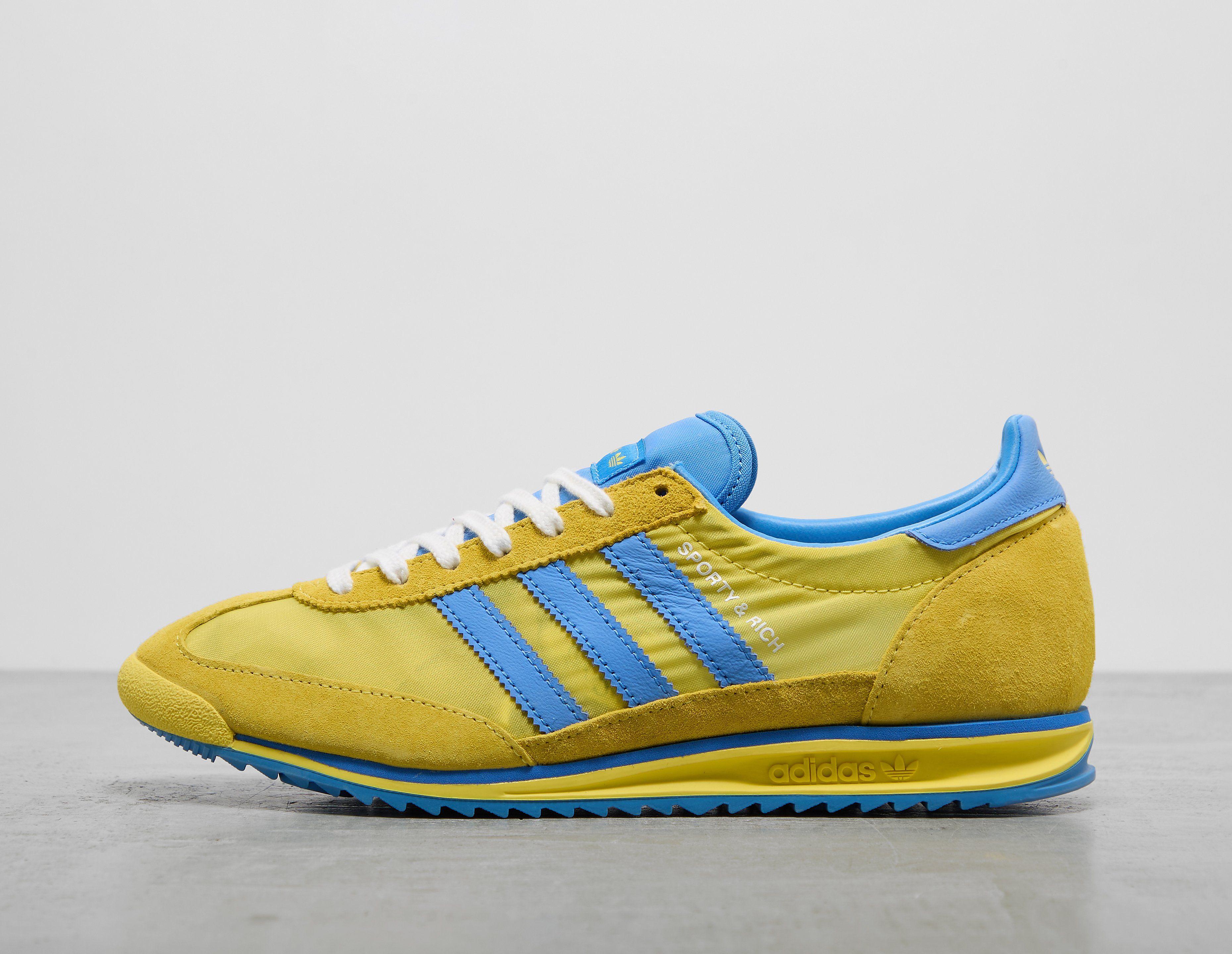 yellow addidas trainers
