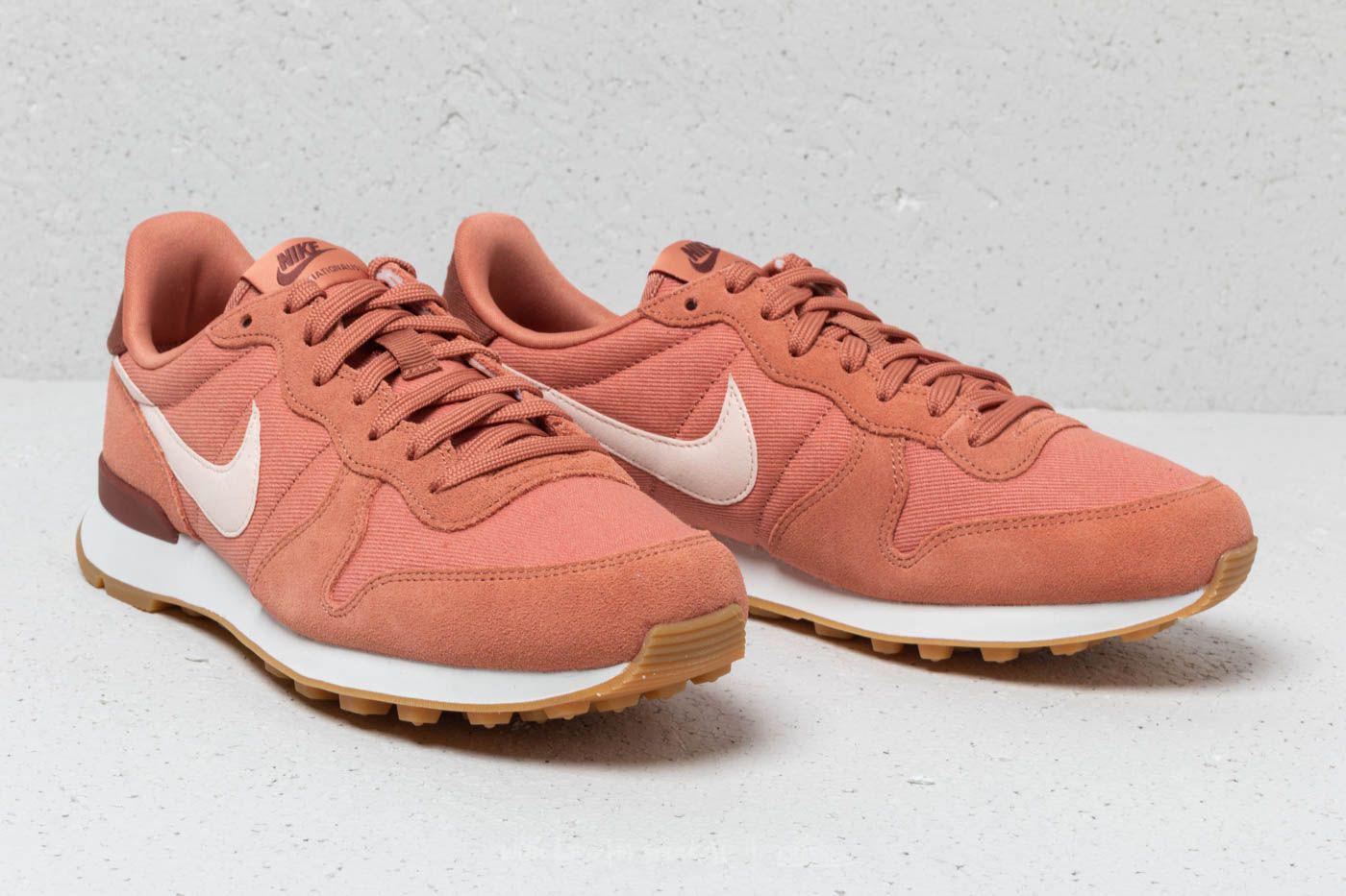 nike blush internationalist suede trainers