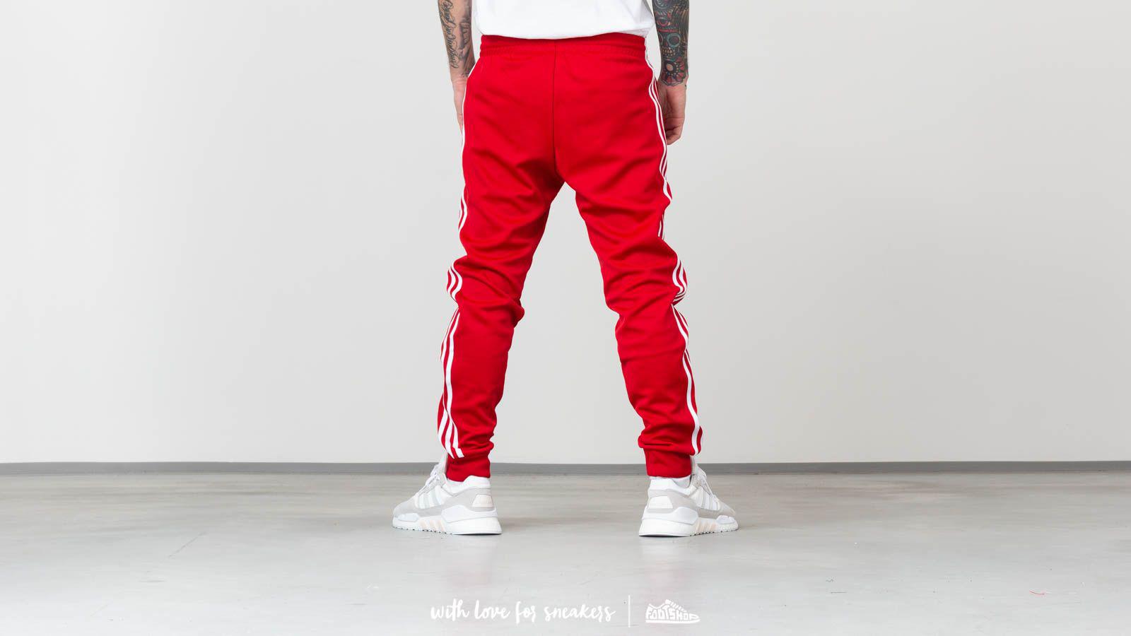 adidas superstar track pants red