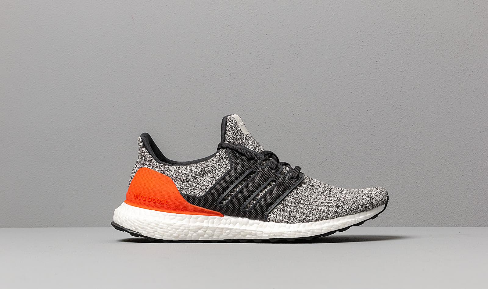 ultra boost raw white active orange