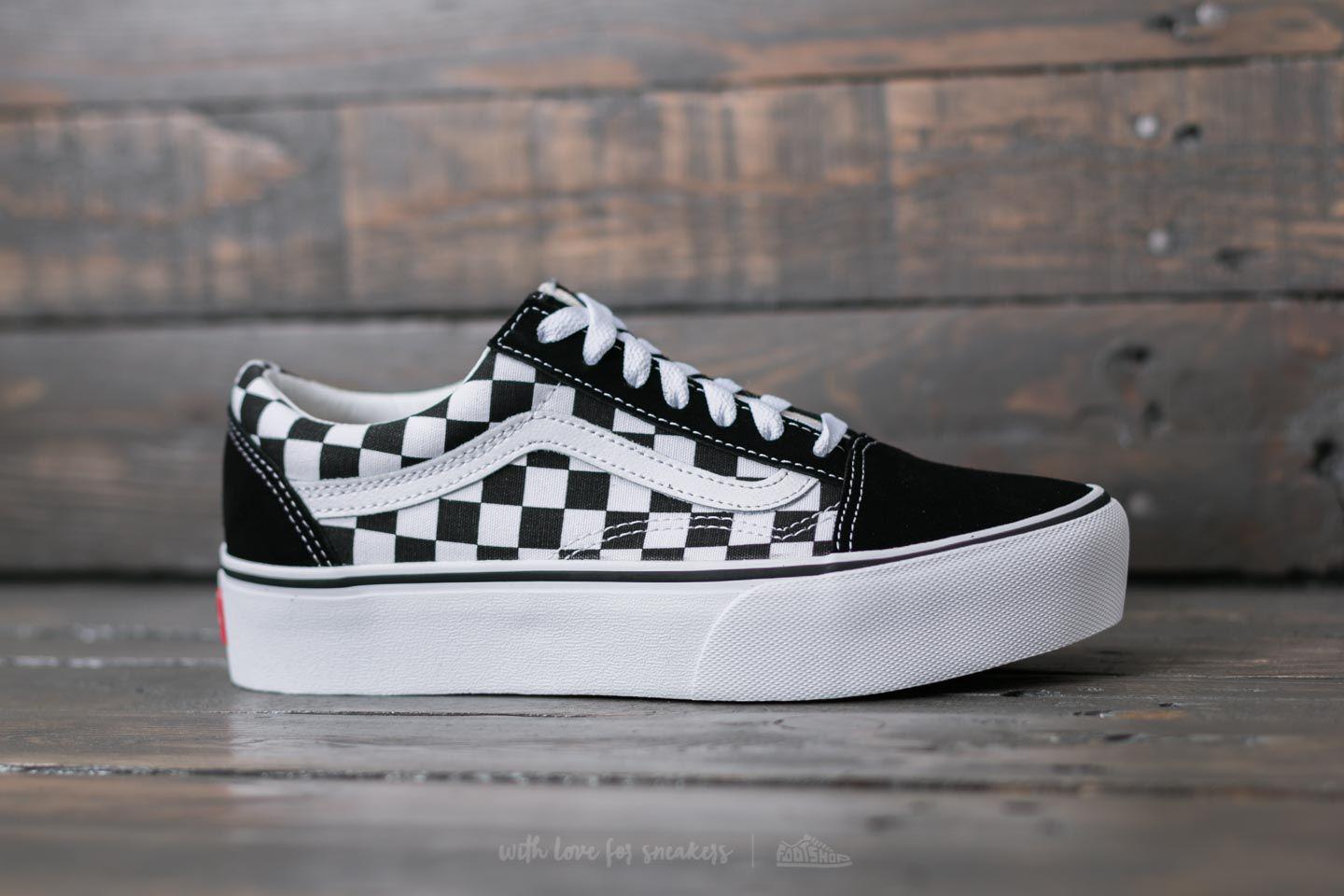 black and white checkered vans with yellow line