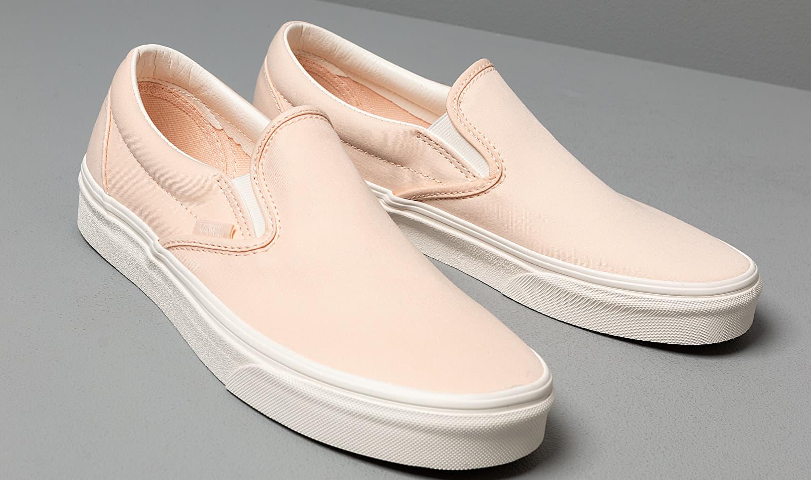 cream slip on vans