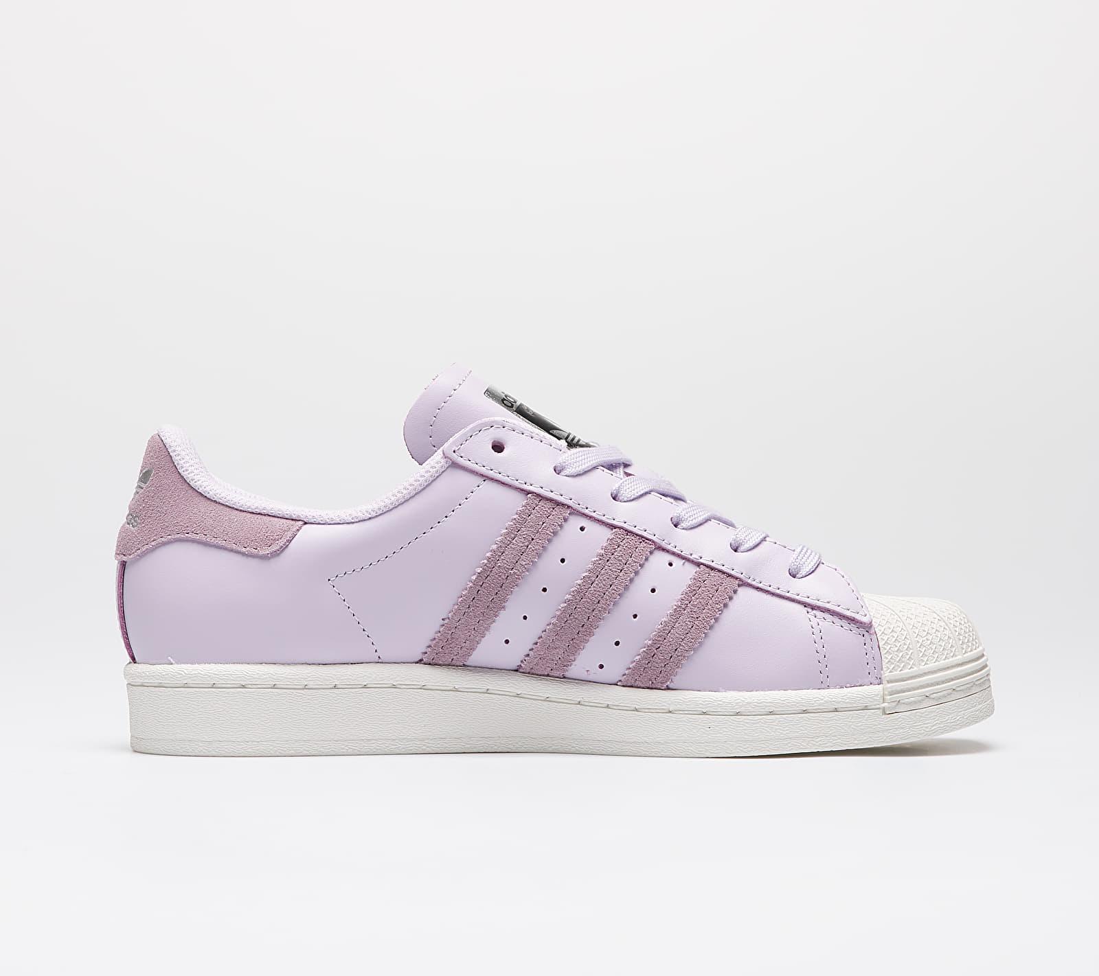 white and purple adidas