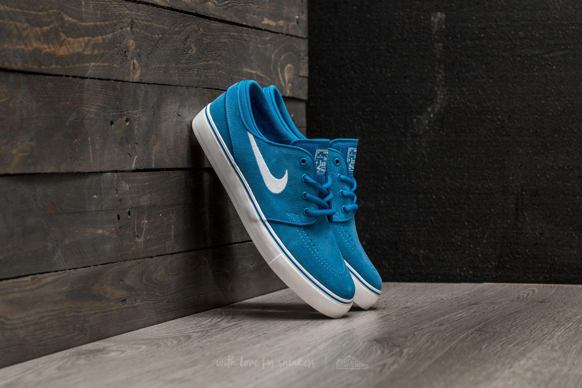 white and blue janoskis