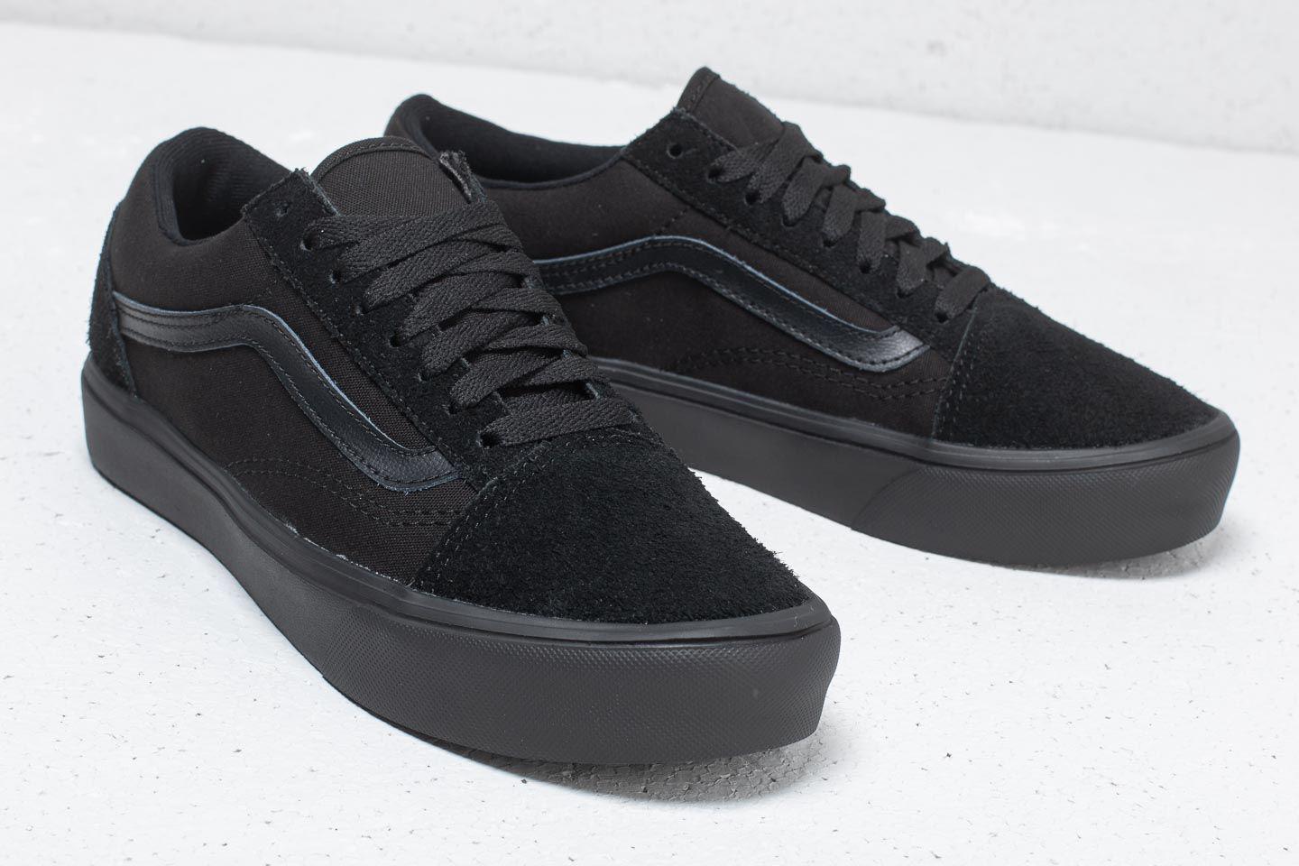 black old skool vans with black laces