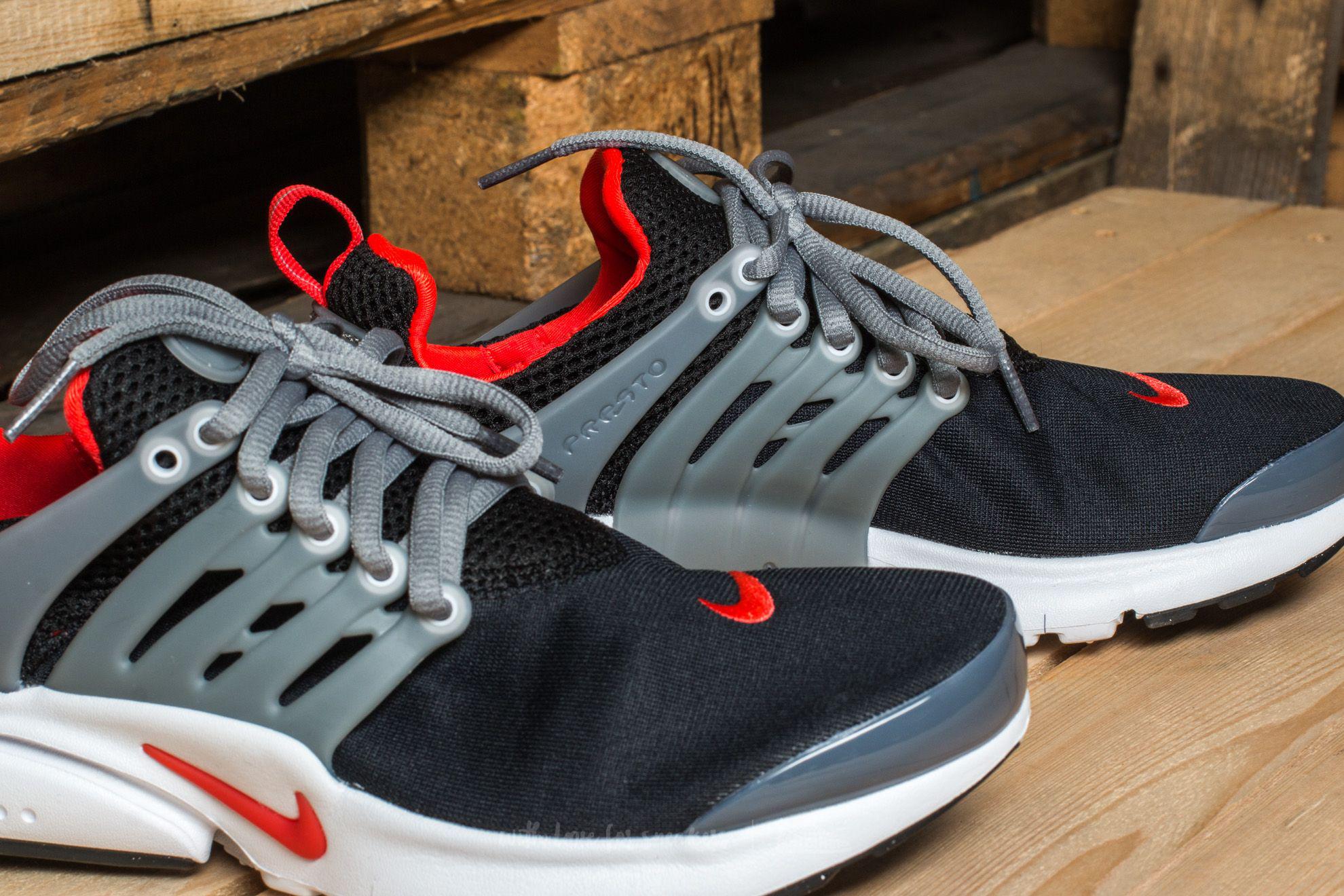 orange and black nike presto