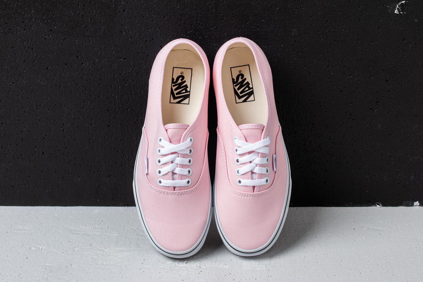 white and pink vans