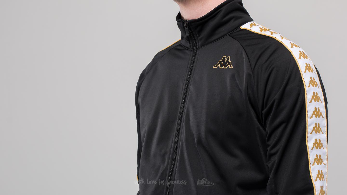 gold and black kappa tracksuit