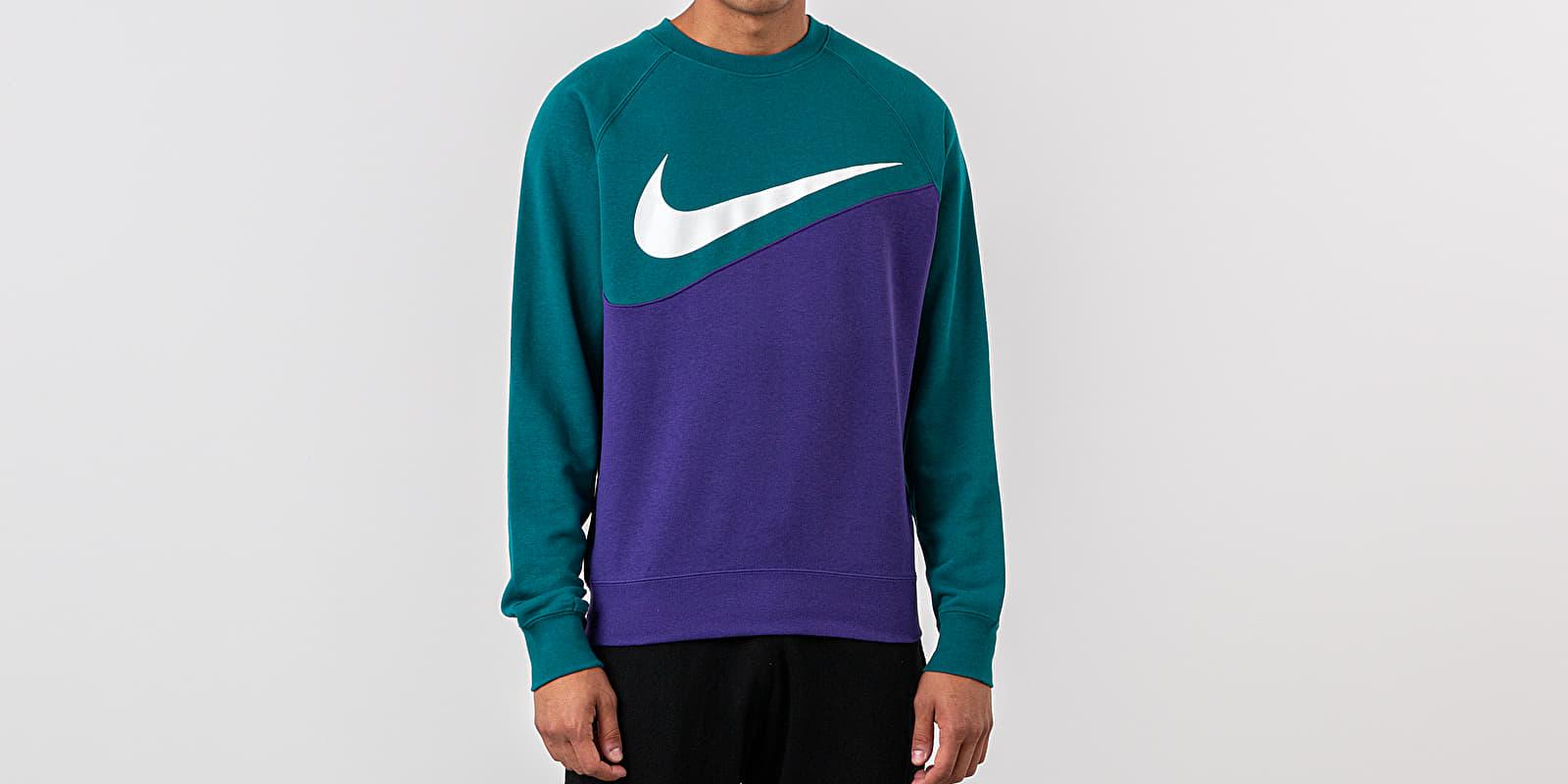 purple and turquoise nike shirt