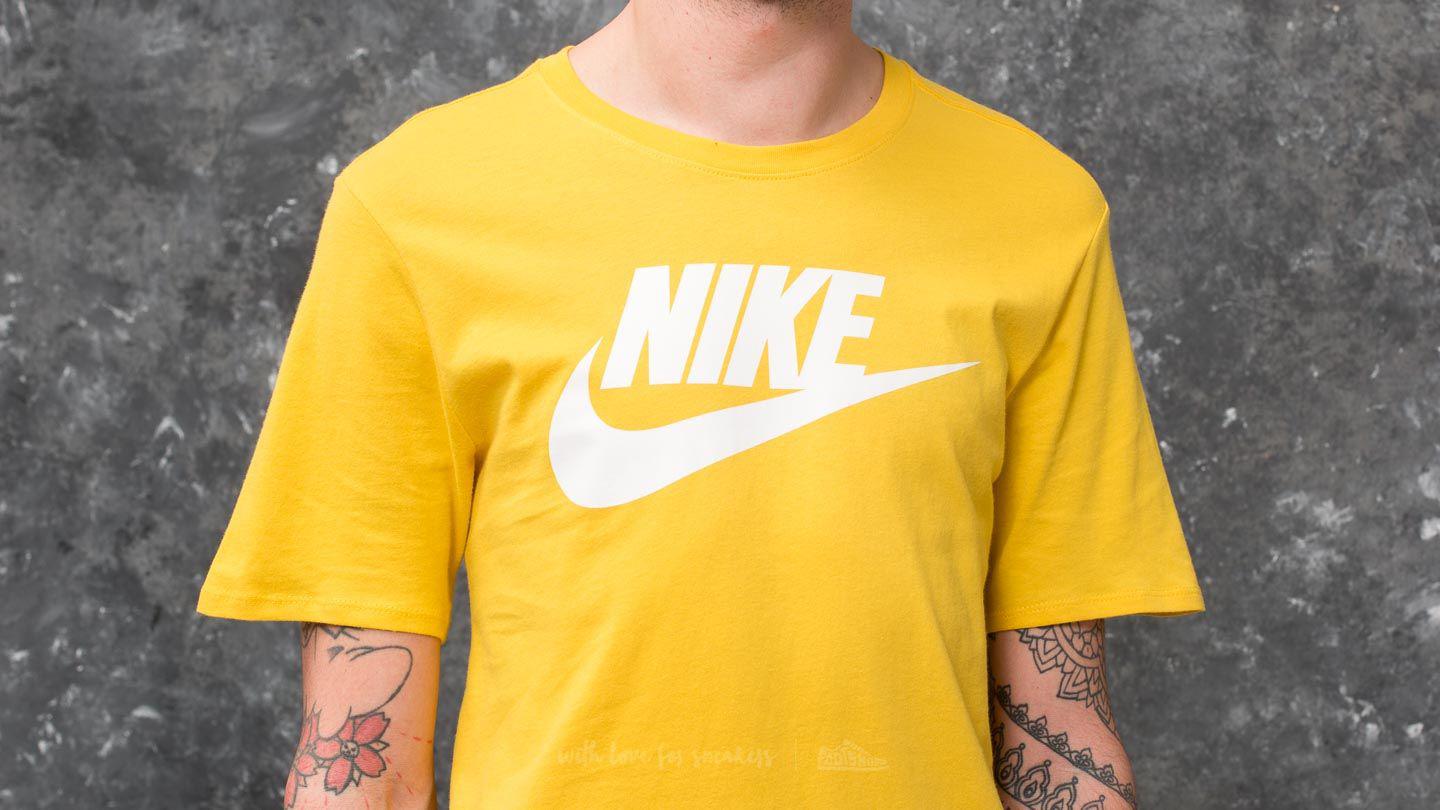 yellow and white nike shirt