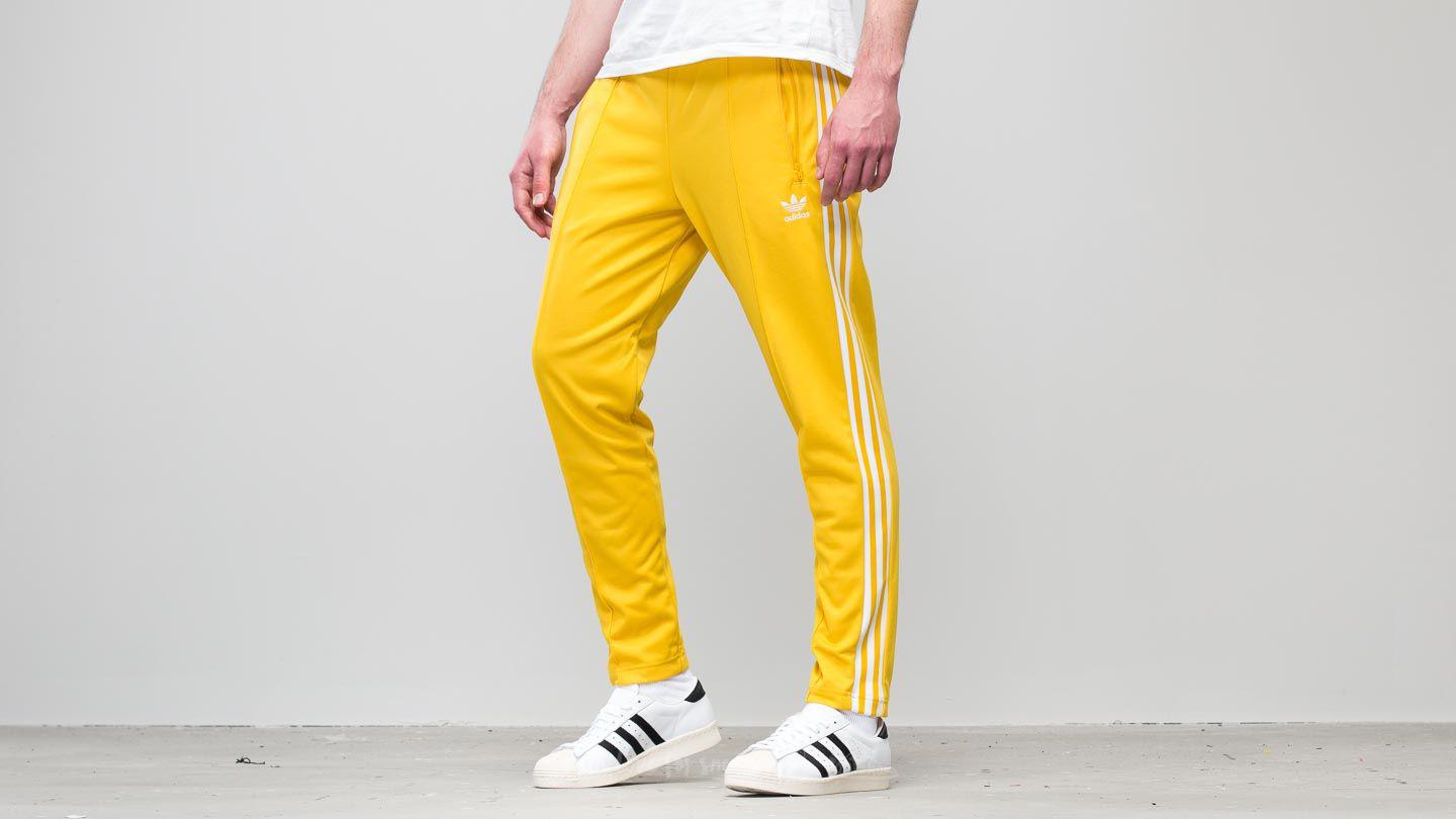 Желтые штаны мужские. Adidas Beckenbauer Pants. Adidas Beckenbauer брюки. Adidas Originals Beckenbauer track Pants. Штаны adidas Originals мужские жёлтые.