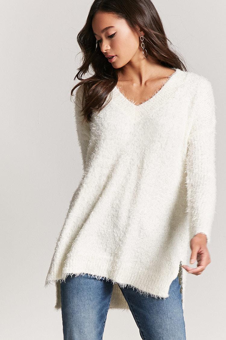 white fuzzy v neck sweater