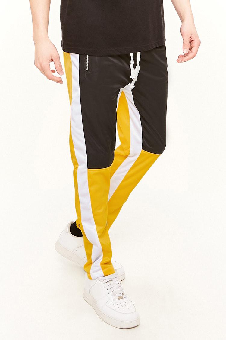 black and yellow track pants