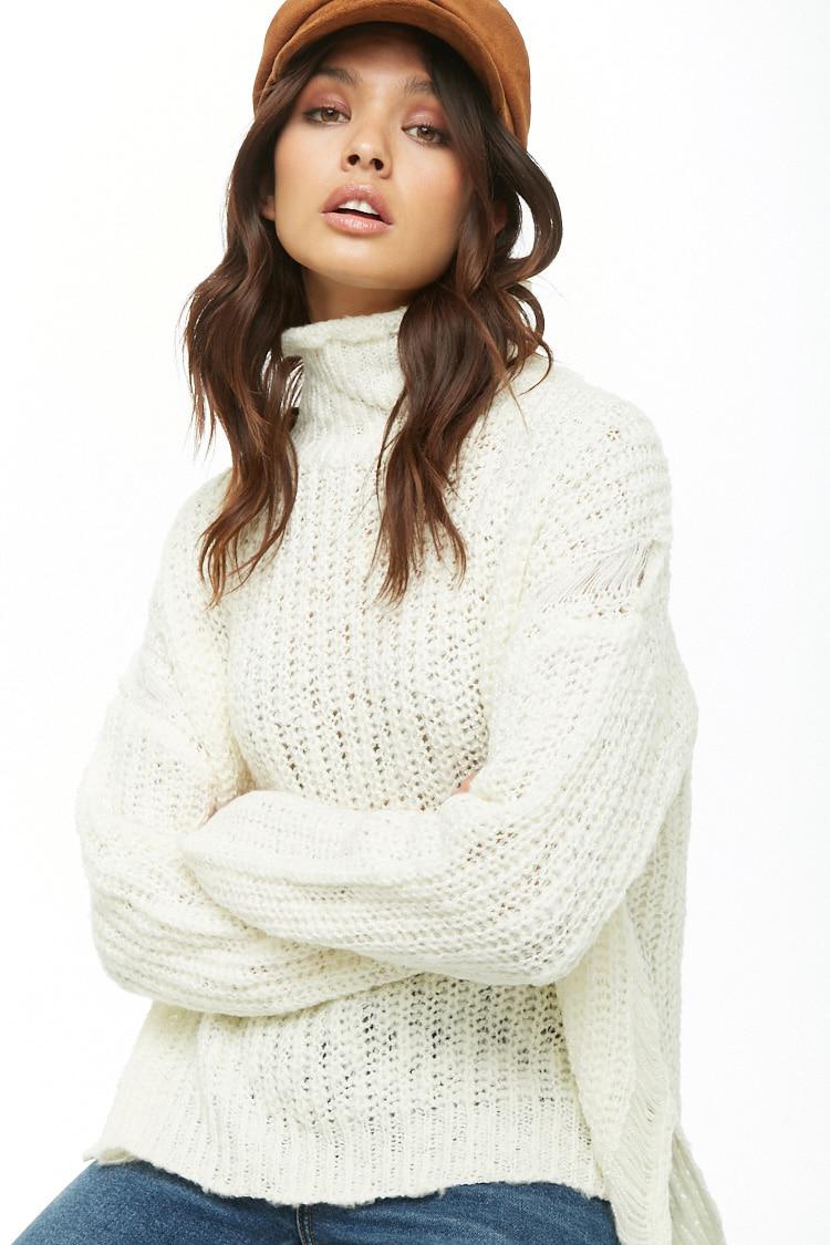 white chunky turtleneck sweater