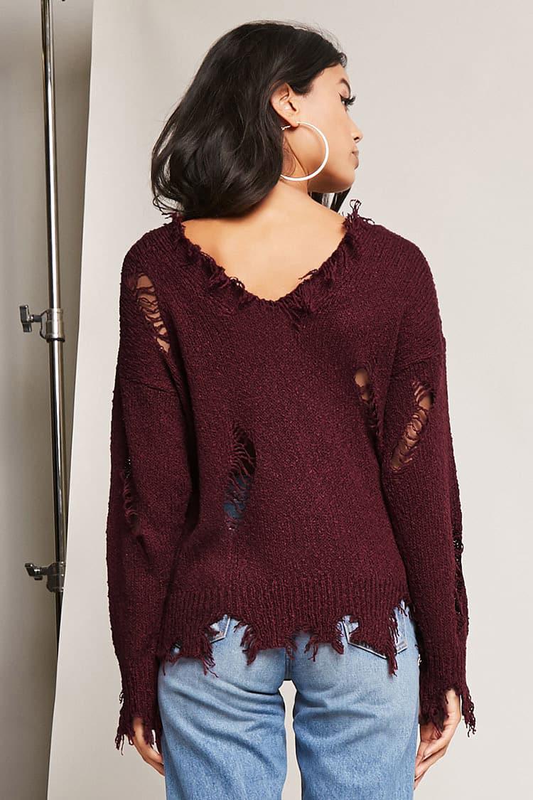distressed trim sweater
