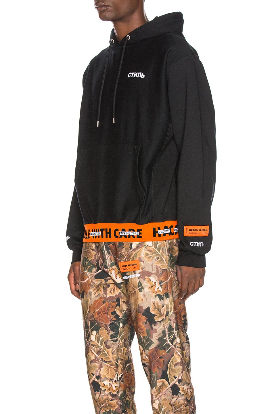 heron preston handle with care hoodie