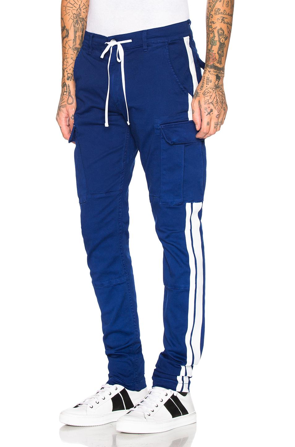 Amiri Cotton Stack Track Cargo Pants in Blue for Men | Lyst UK