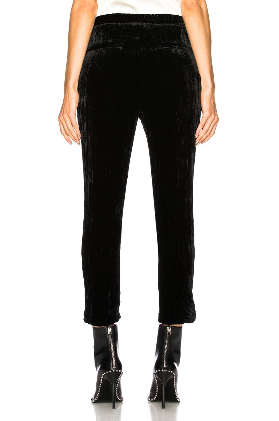red belted pants