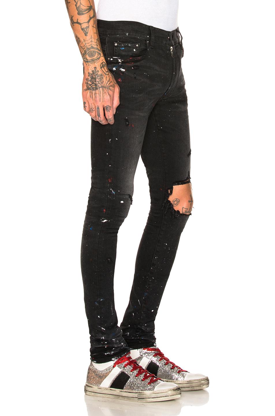 amiri artist broken jeans