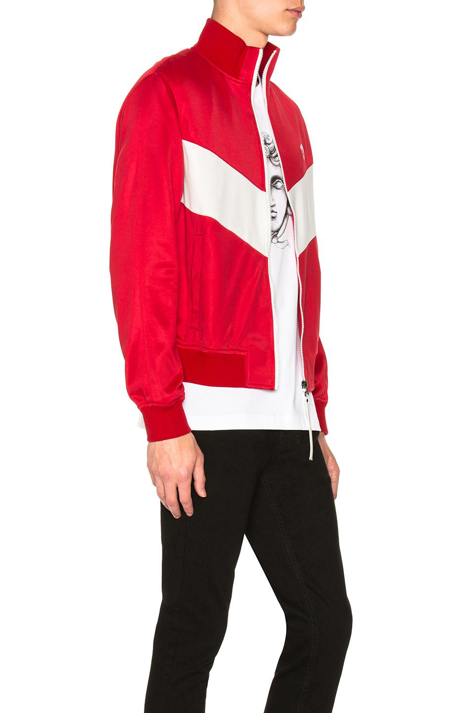 red and white track jacket