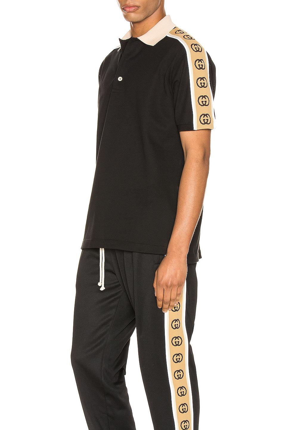 polo with interlocking g stripe